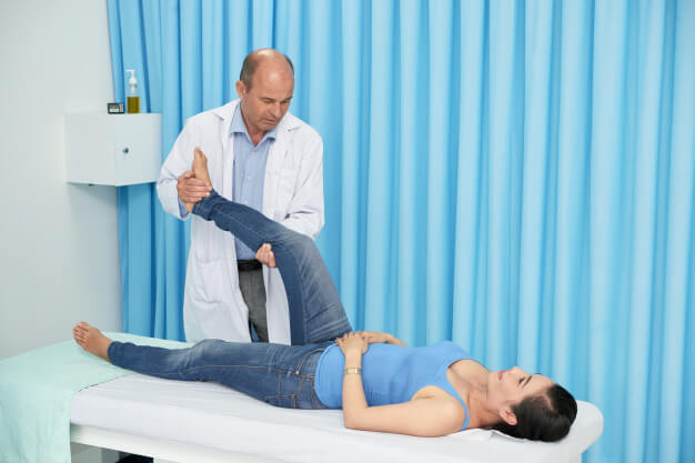 Physiotherapist Performing Vestibular Rehabilitation