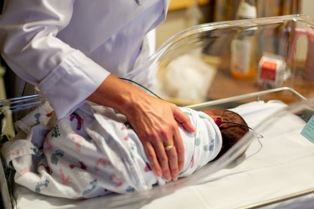 Pediatrician in JP Nagar taking care of baby