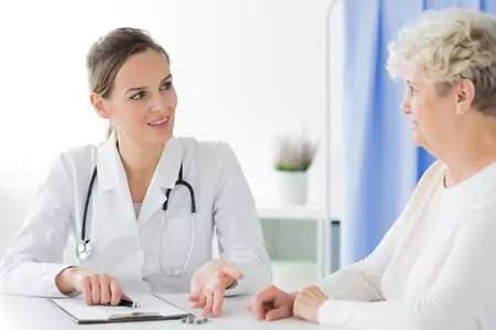 A Doctor Talking To A Patient