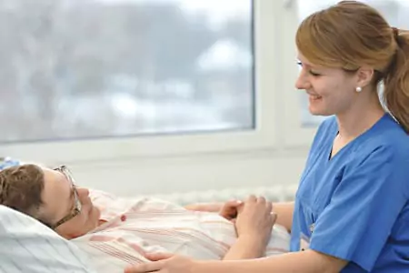 A Nurse Taking Care Of A Patient